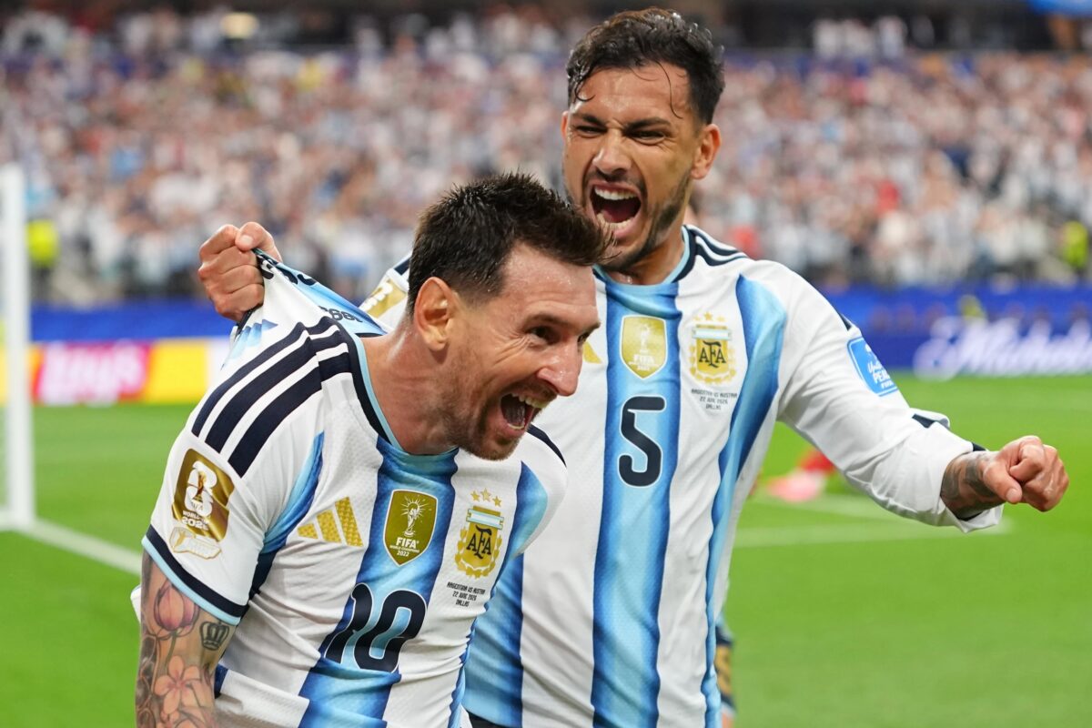 Messi sets World Cup scoring record as defending champion Argentina advances to knockout stage